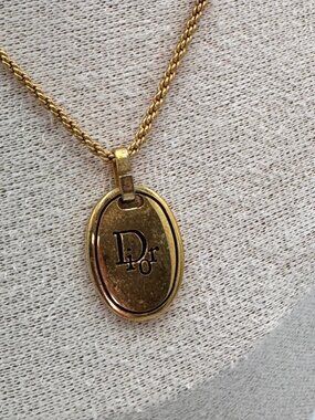 Vintage Christian Dior Gold Tone Oval Dior Logo Pendant